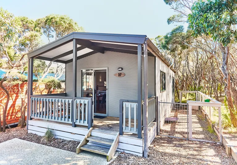 Deck with gate and fenced off dog area