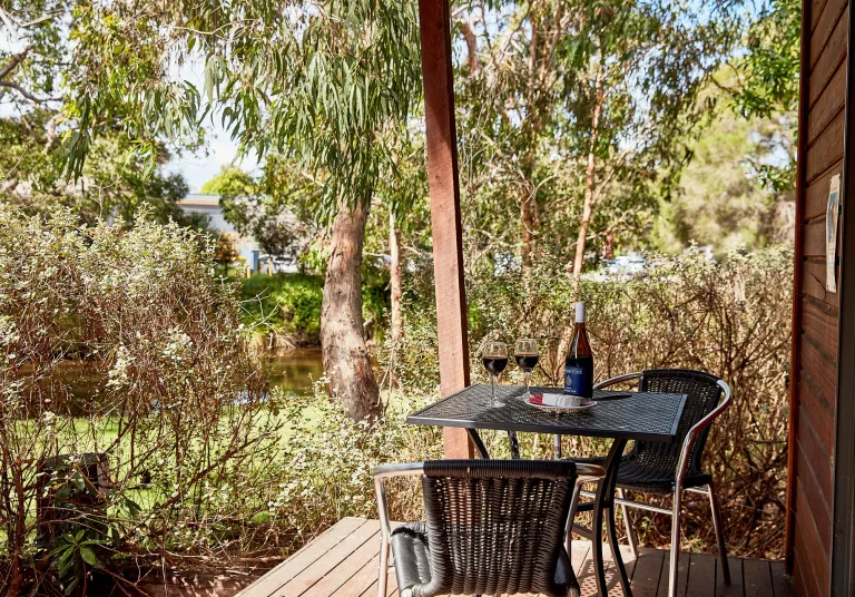 Deck with river view and outdoor furniture